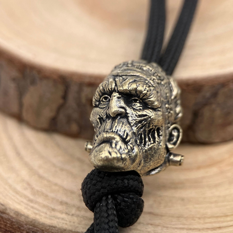 Paracord Survival Bracelet - Crazy scientist Head Sculpture Brass Knife